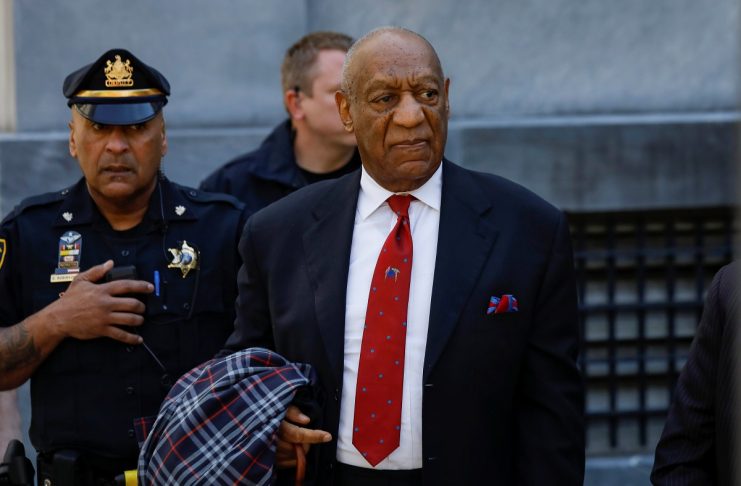 Actor and comedian Bill Cosby exits the Montgomery County Courthouse after a jury convicted him in a sexual assault retrial in Norristown, Pennsylvania