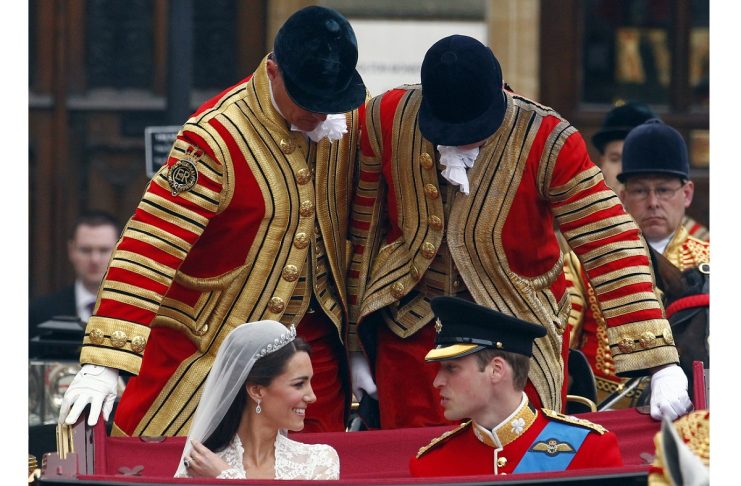Britain’s Prince William, and Catherine, Duchess of Cambridge travel to Buckingham Palace after their wedding in Westminster Abbey in London