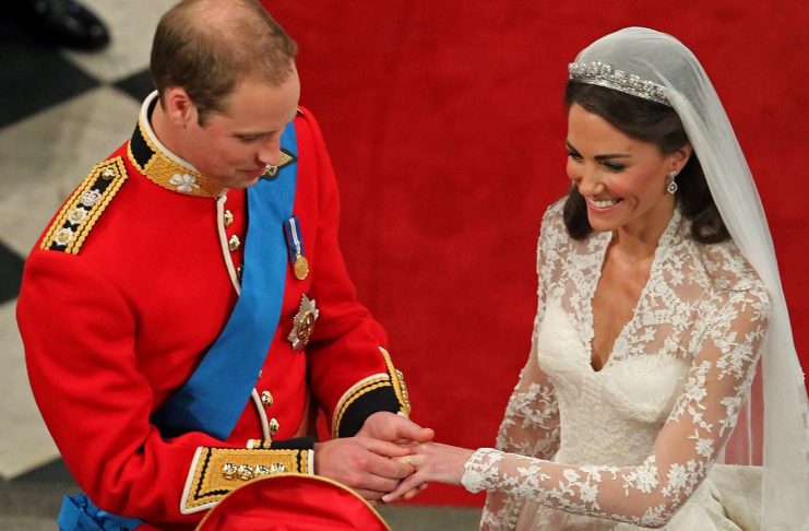 Britain’s Prince William, and Kate Middleton exchange rings before the Archbishop of Canterbury, Rowan Williams, during their wedding ceremony In Westminster Abbey, in central London