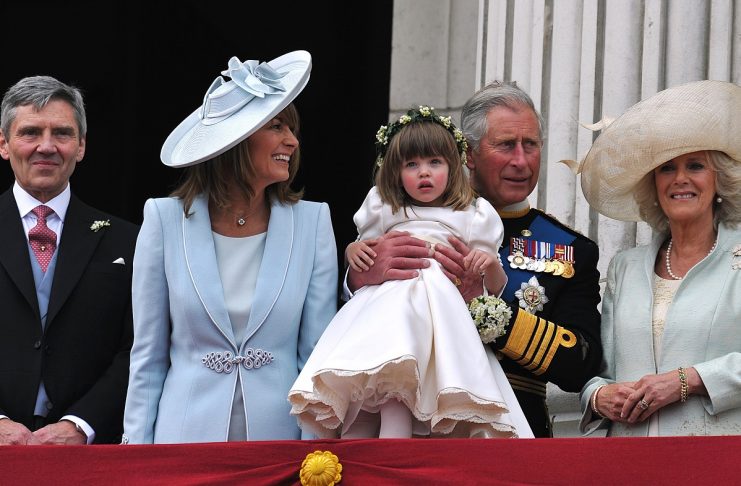 Michael and Carole Middleton and members of Britain’s royal family stand on the balcony of Buckingham Palace in London