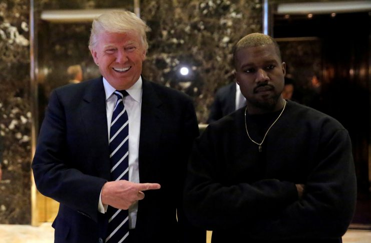 U.S. President-elect Donald Trump and musician Kanye West pose for media at Trump Tower in Manhattan, New York City