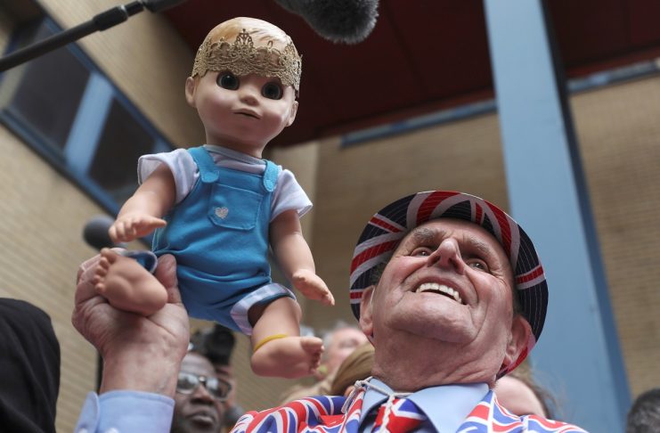 A supporter of the royal family celebrates outside the Lindo Wing of St Mary’s Hospital after Britain’s Catherine, the Duchess of Cambridge, gave birth to a son, in London