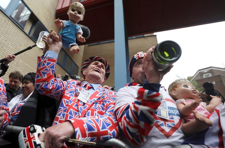 Supporters of the royal family celebrate outside the Lindo Wing of St Mary’s Hospital after Britain’s Catherine, the Duchess of Cambridge, gave birth to a son, in London