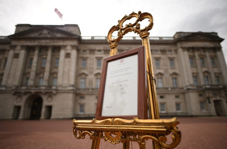 A notice is placed on an easel in the forecourt of Buckingham Palace to formally announce the birth of a baby boy to the Britain’s Catherine, the Duchess of Cambridge, and Prince William, in London