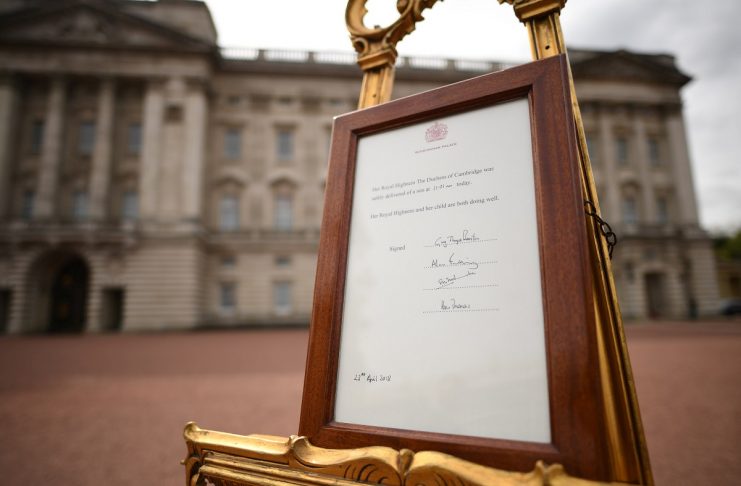 A notice is placed on an easel in the forecourt of Buckingham Palace to formally announce the birth of a baby boy to the Britain’s Catherine, the Duchess of Cambridge, and Prince William, in London