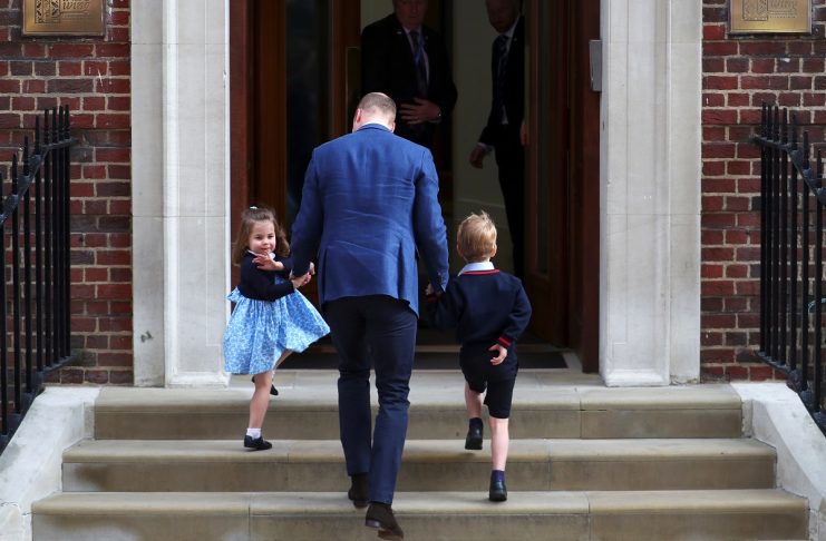 Britain’s Prince William arrives at the Lindo Wing of St Mary’s Hospital with his children Prince George and Princess Charlotte after his wife Catherine, the Duchess of Cambridge, gave birth to a son, in London