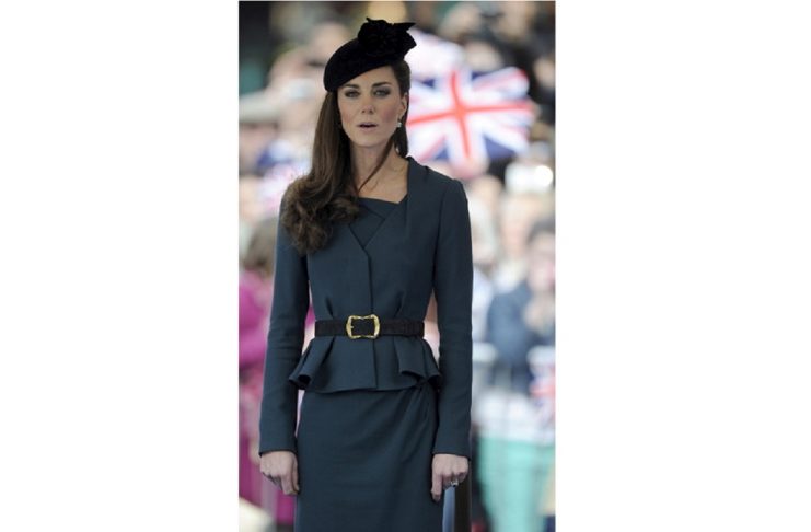 A combination photo shows Britain’s Catherine, Duchess of Cambridge, during a visit to Leicester March 8, 2012 and attending a charity event at city company ICAP in London (R) December 9, 2015.