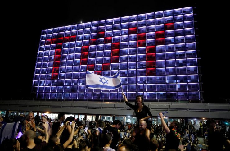 People celebrate the winning of the Eurovision Song Contest 2018 by Israel’s Netta Barzilai with her song “Toy” , Rabin square in Tel Aviv Israel