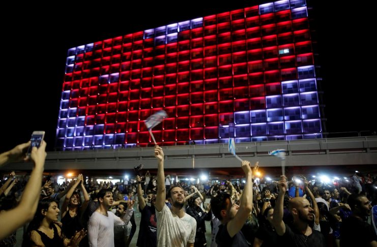 People celebrate the winning of the Eurovision Song Contest 2018 by Israel’s Netta Barzilai with her song “Toy” , at Rabin square in Tel Aviv