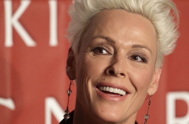 Danish actress Nielsen smiles during a news conference in Vienna
