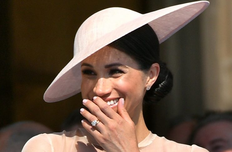 Meghan, Duchess of Sussex attends a garden party at Buckingham Palace, in London