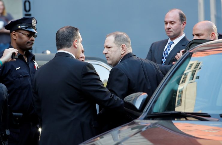 Film producer Harvey Weinstein arrives at the 1st Precinct in Manhattan in New York