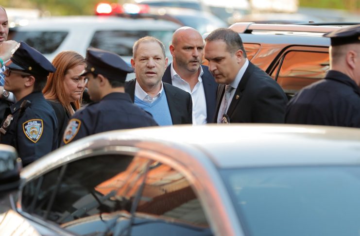 Film producer Harvey Weinstein arrives at the 1st Precinct in Manhattan in New York