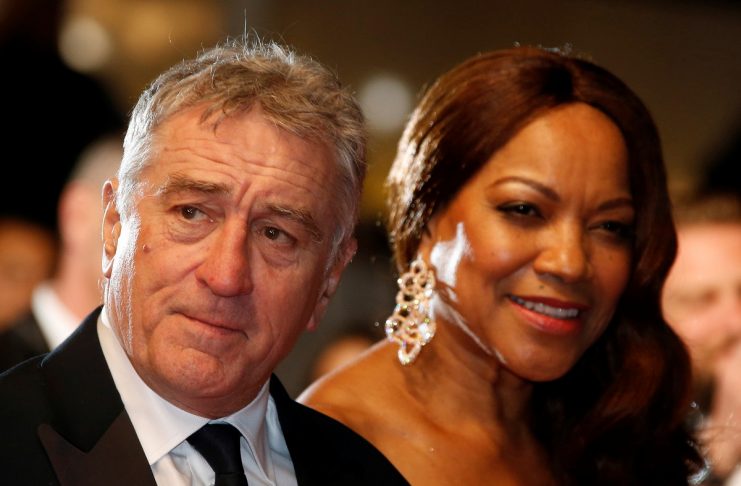 Cast member Robert De Niro and his wife Grace Hightower pose on the red carpet as they arrive for the screening of the film “Hands of Stone” out of competition at the 69th Cannes Film Festival in Cannes