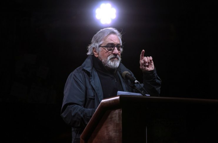 Actor Robert De Niro speaks at a protest against U.S. President-elect Donald Trump outside Trump International Hotel in New York City