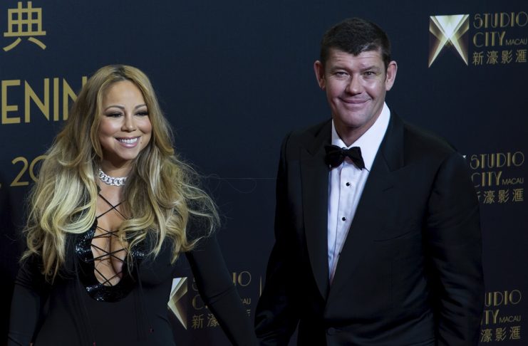 Singer Mariah Carey and billionaire James Packer pose on the red carpet before the opening ceremony of Studio City and the premiere of the short film “The Audition” in Macau