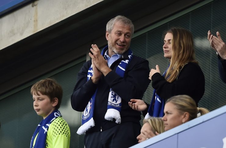 Chelsea owner Roman Abramovich applauds fans after winning the Premier League