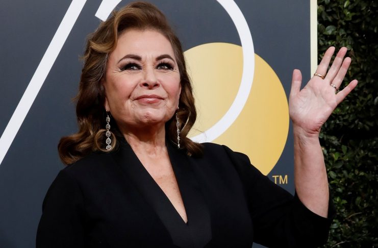Actress Roseanne Barr waves on her arrival to the 75th Golden Globe Awards in Beverly Hills