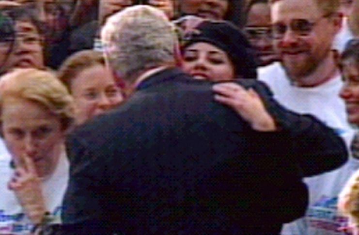 FILE PHOTO 6NOV96 – Former White House intern Monica Lewinsky hugs President Clinton at the White Ho..