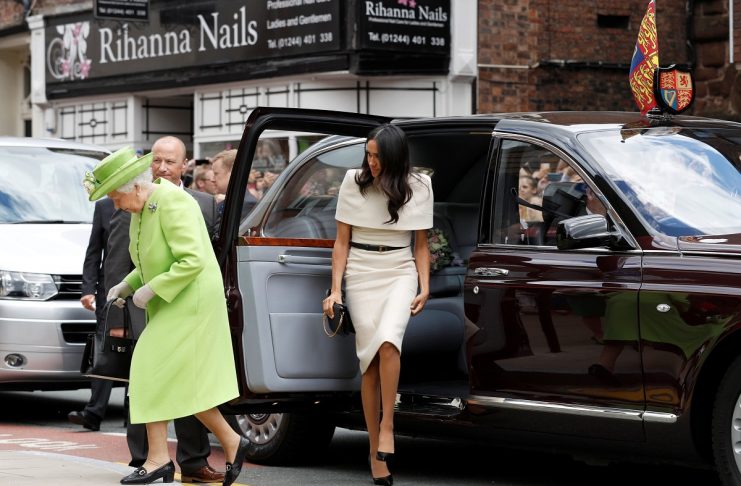 BBritain’s Queen Elizabeth and Meghan, the Duchess of Sussex, arrive at the Storyhouse during their visit to Chester