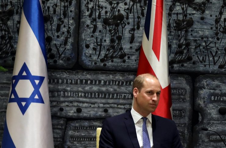 Britain’s Prince William sits during a meeting with Israeli President Reuven Rivlin, at the Israeli president’s residence in Jerusalem