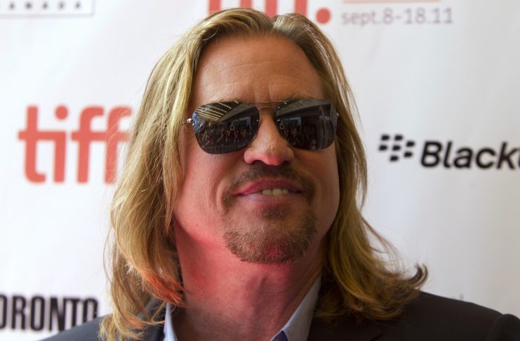 Actor Val Kilmer arrives on the red carpet for “Twixt” during the 36th Toronto International Film Festival in Toronto