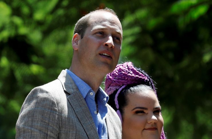 Britain’s Prince William stands next to Israeli 2018 Eurovision song contest winner Netta Barzilai during a tour of Rothschild Boulevard, in Tel Aviv, Israel