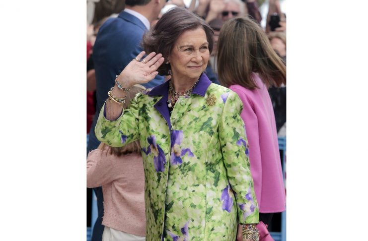 Spain’s former Queen Sofia waves before attending an Easter mass at the cathedral in Palma de Mallorca