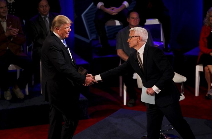 Republican U.S. Presidential candidate Donald Trump shakes hands with CNN anchor Anderson Cooper at the CNN Town Hall at Riverside Theater in Milwaukee