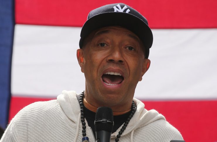 Producer Russell Simmons take part in an “I am Muslim Too” rally in Times Square Manhattan, New York