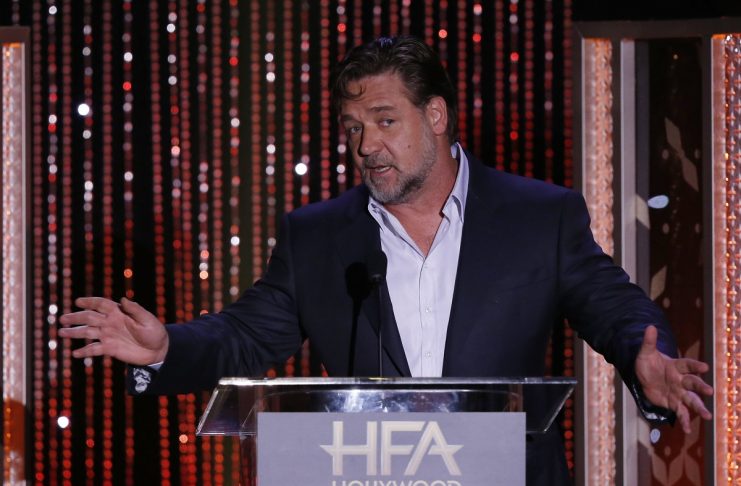 Actor Russell Crowe presents the Hollywood Producer Award at the Hollywood Film Awards in Beverly Hills