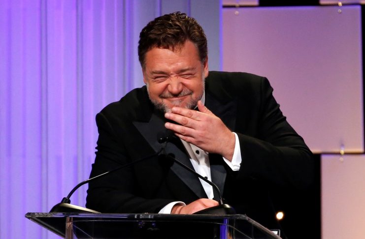 Actor Crowe mimics director Ridley Scott at the 30th annual American Cinematheque Award ceremony in Beverly Hills