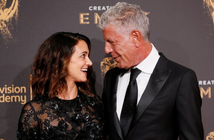 Chef Anthony Bourdain and actor Asia Argento pose at the 2017 Creative Arts Emmy Awards in Los Angeles