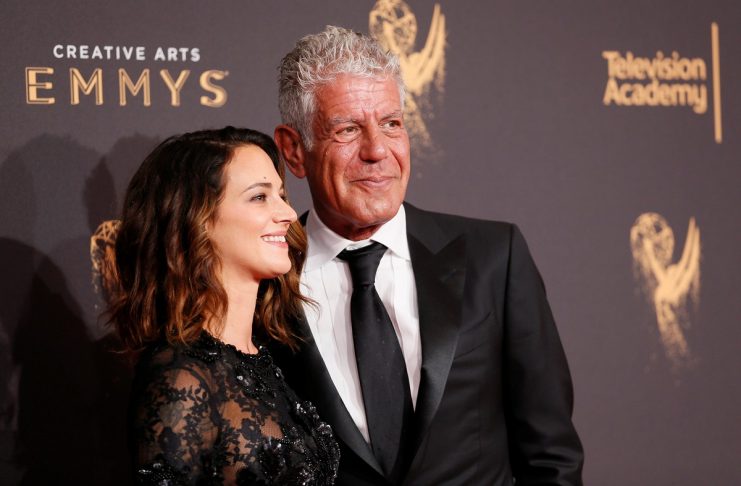 Chef Anthony Bourdain and actor Asia Argento pose at the 2017 Creative Arts Emmy Awards in Los Angeles