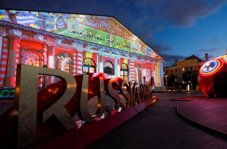 A 2018 FIFA World Cup sign is seen in front of Moscow’s Manezh building during a preview of a laser show in Moscow