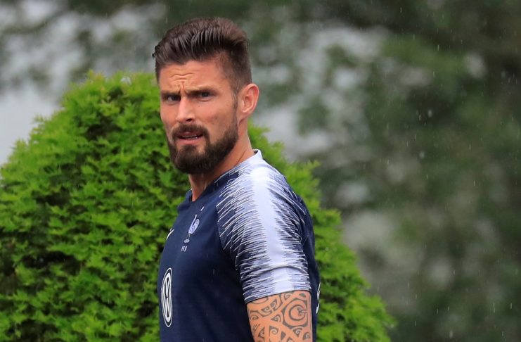 France’s Olivier Giroud arrives to attend the visit of French President Emmanuel Macron at the French national football team training center in Clairefontaine near Paris