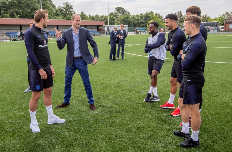 Britain’s Prince William talks with members of the England soccer team as he visits them while they prepare for the FIFA 2018 Football World Cup, at the Leeds United training ground, in Leeds
