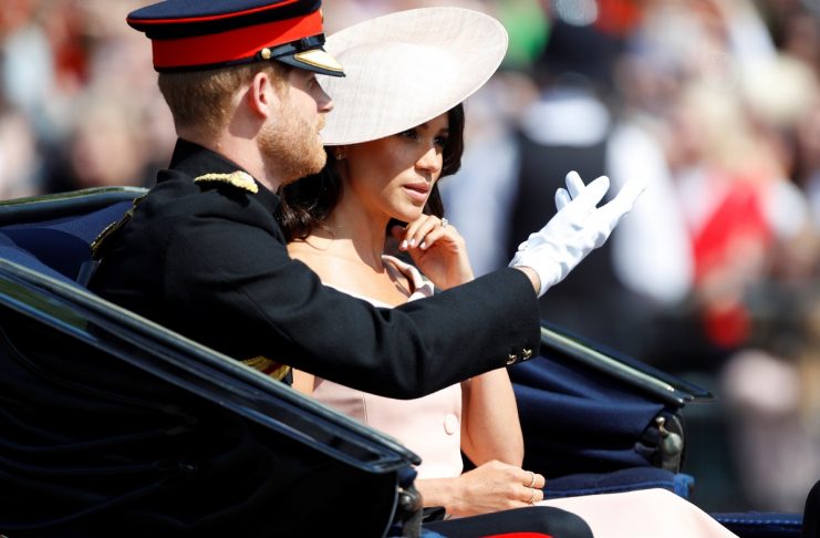 Britain’s Prince Harry and Meghan, Duchess of Sussex, take part in the Trooping the Colour parade in central London