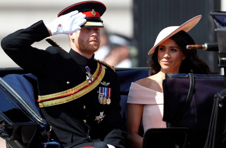 Britain’s Prince Harry and Meghan, Duchess of Sussex, take part in the Trooping the Colour parade in central London