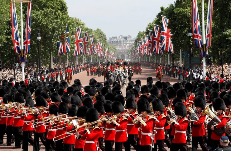 Coldstream Guards and The Household Cavalry march down The Mall as part of Trooping the Colour in central London