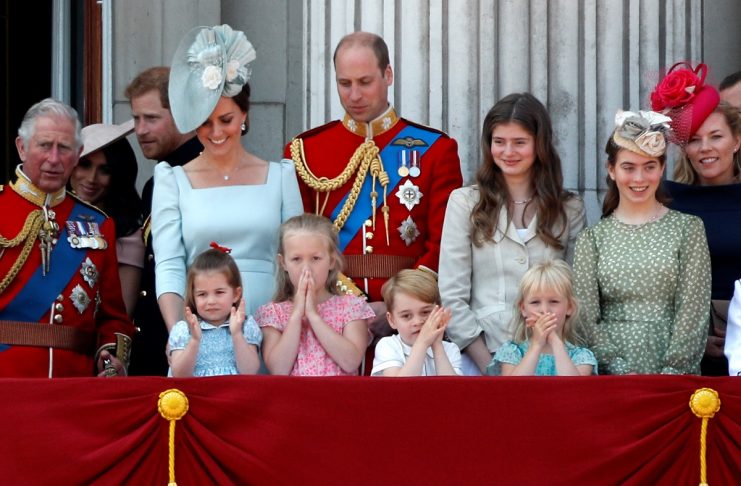 Younger members of Britain’s royal family, along with Prince William and Catherine, Duchess of Cambridge, wave from the balcony of Buckingham Palace as part of Trooping the Colour parade in central London