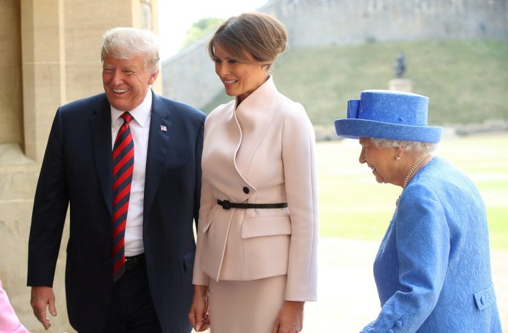 U.S. President Donald Trump, First Lady Melania Trump and Britain’s Queen Elizabeth Queen walk from the Quadrangle after inspecting an honour guard, Windsor