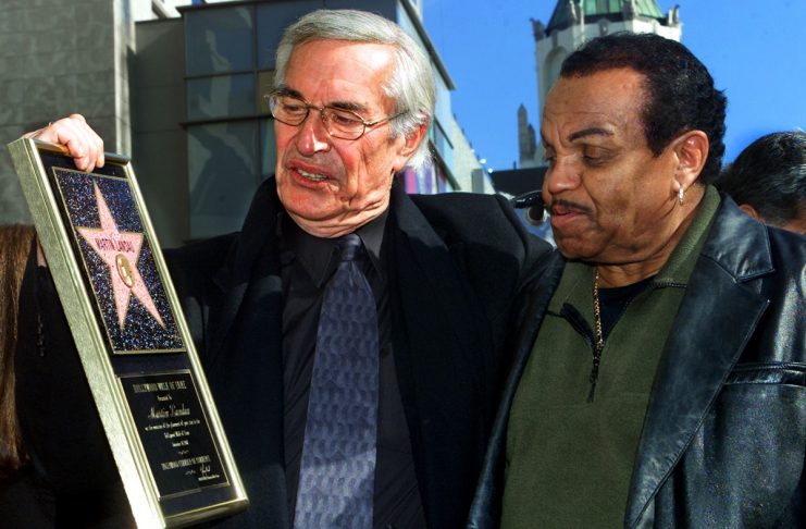 Academy award winning actor Martin Landau (L), shows music producer Joe Jackson his plaque during ce..