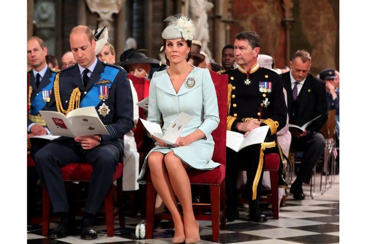 Britain’s Prince Wiliam and Catherine, Duchess of Cambridge sit in Westminster Abbey for a service to mark the centenary of the Royal Air Force, in central London