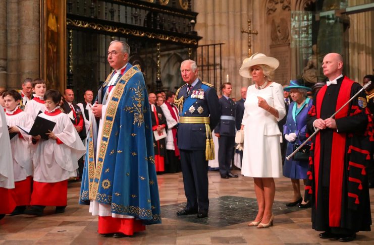 Britain’s Queen Elizabeth, Prince Charles and Camilla, Duchess of Cornwall wait in Westminster Abbey for a service to mark the centenary of the Royal Air Force, in central London