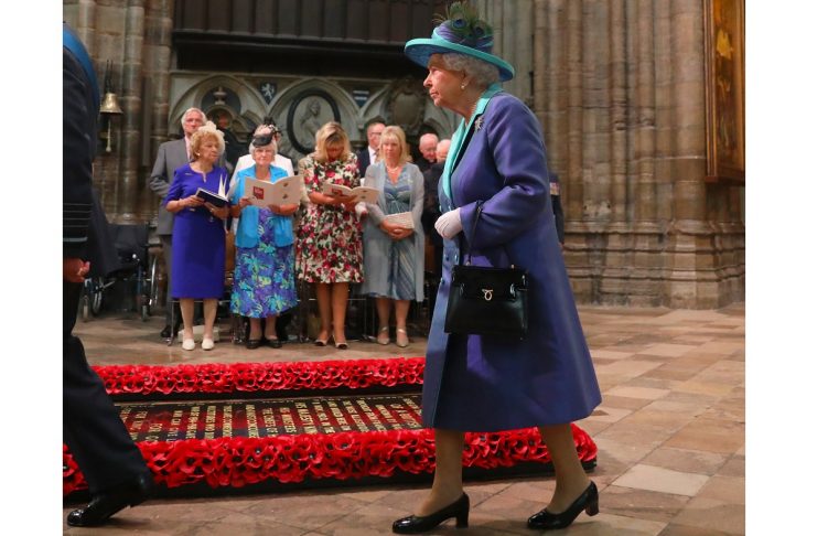 Britain’s Queen Elizabeth arrives in Westminster Abbey for a service to mark the centenary of the Royal Air Force, in central London
