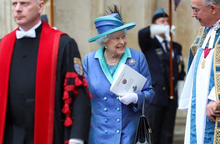 Britain’s Queen Elizabeth leaves Westminster Abbey after a service to mark the centenary of the Royal Air Force in central London