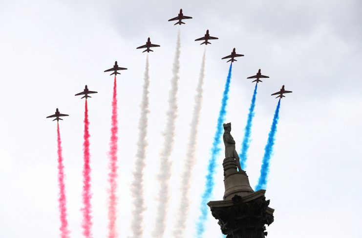 The Red Arrows perform a fly past over Trafalgar Square to mark the centenary of the Royal Air Force in central London