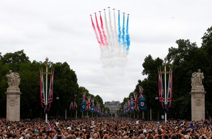 The Red Arrows perform a fly past over the Mall and Buckingham Palace to mark the centenary of the Royal Air Force in central London