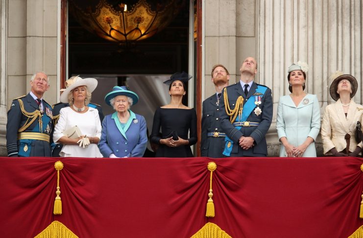 Britain’s Queen Elizabeth is joined by members of the Royal Family on the balcony of Buckingham Palace as they watch a fly past to mark the centenary of the Royal Air Force in central London